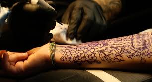 Risk of vaping and getting a tattoo
